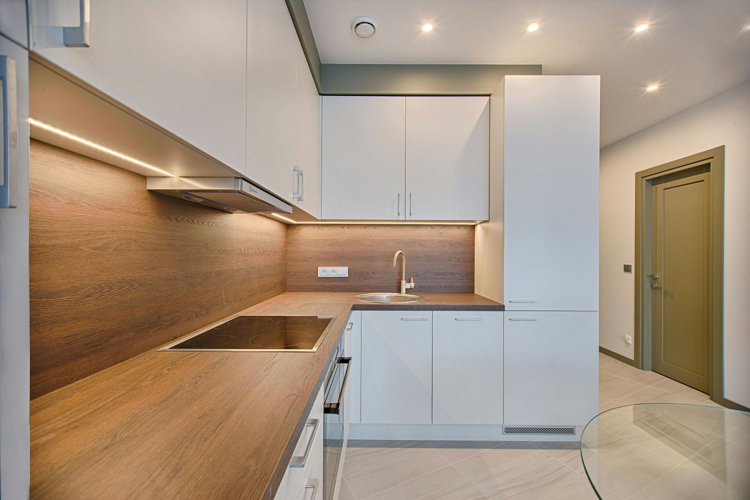 Smart home interior in Woodinville, WA featuring modern lighting, smart thermostat, and connected devices for efficient living.